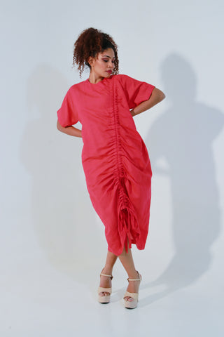 Coral dress in pure linen, includes pull-up string detailing on one side.