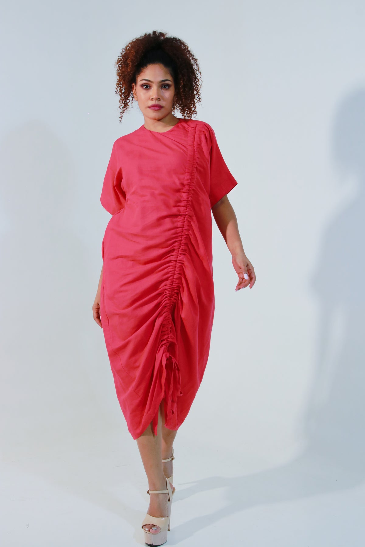 Coral dress in pure linen, includes pull-up string detailing on one side.