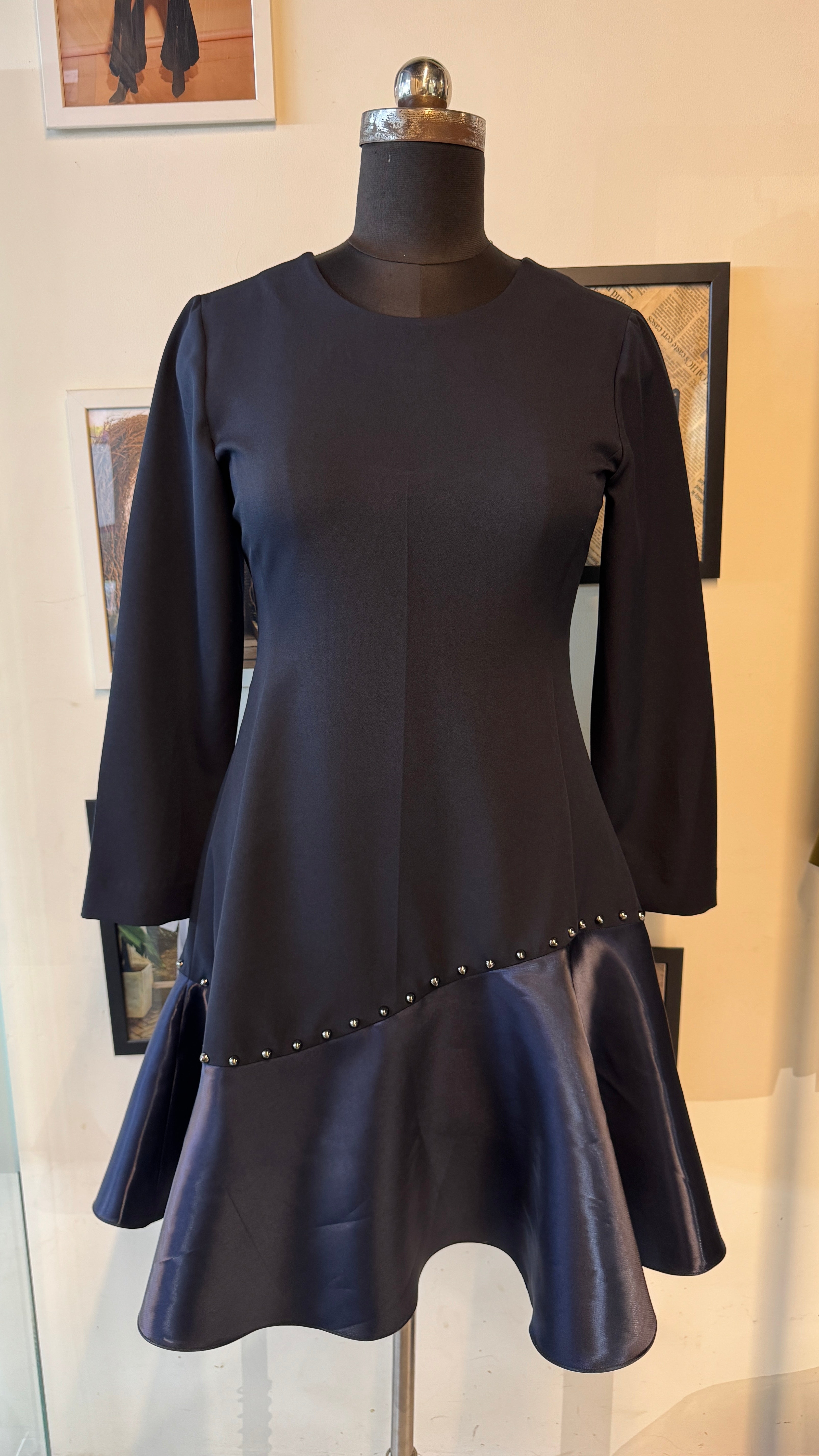 Blue Banana Crepe Fitted Dress With Blue Metallic Curve Ruffle At Base And Rivets