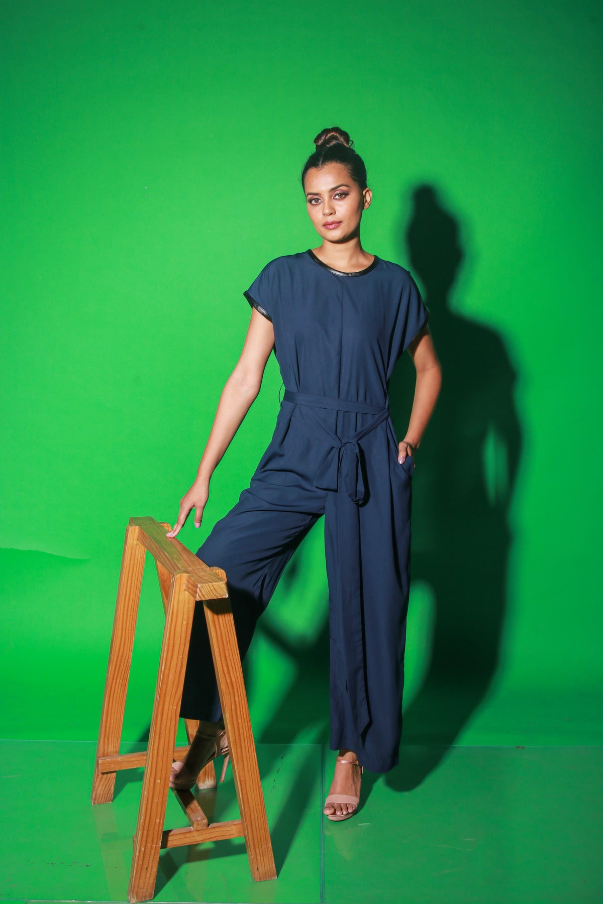 Blue full length jumpsuit with waist tie-up