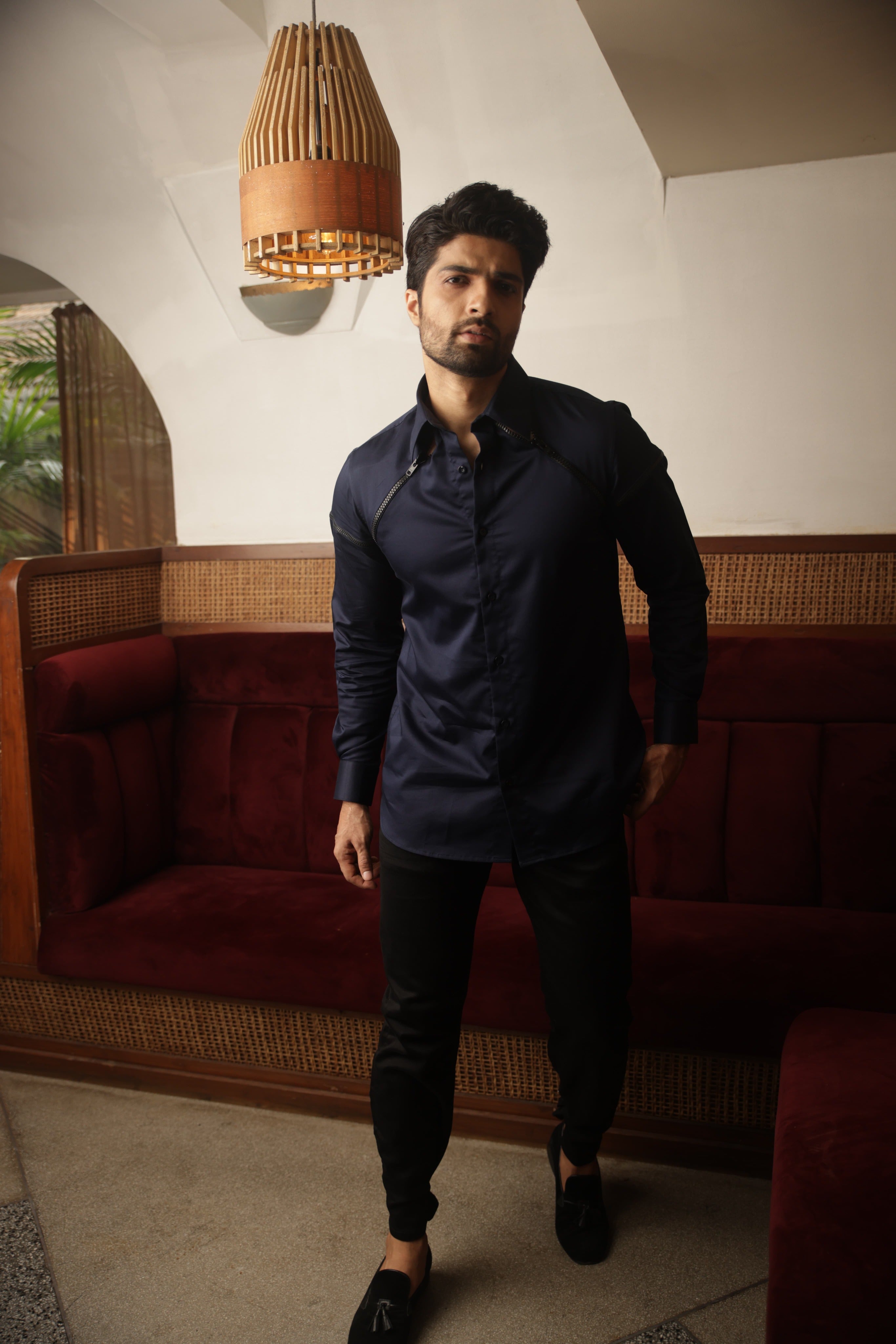 Blue shirt with black zipper feature