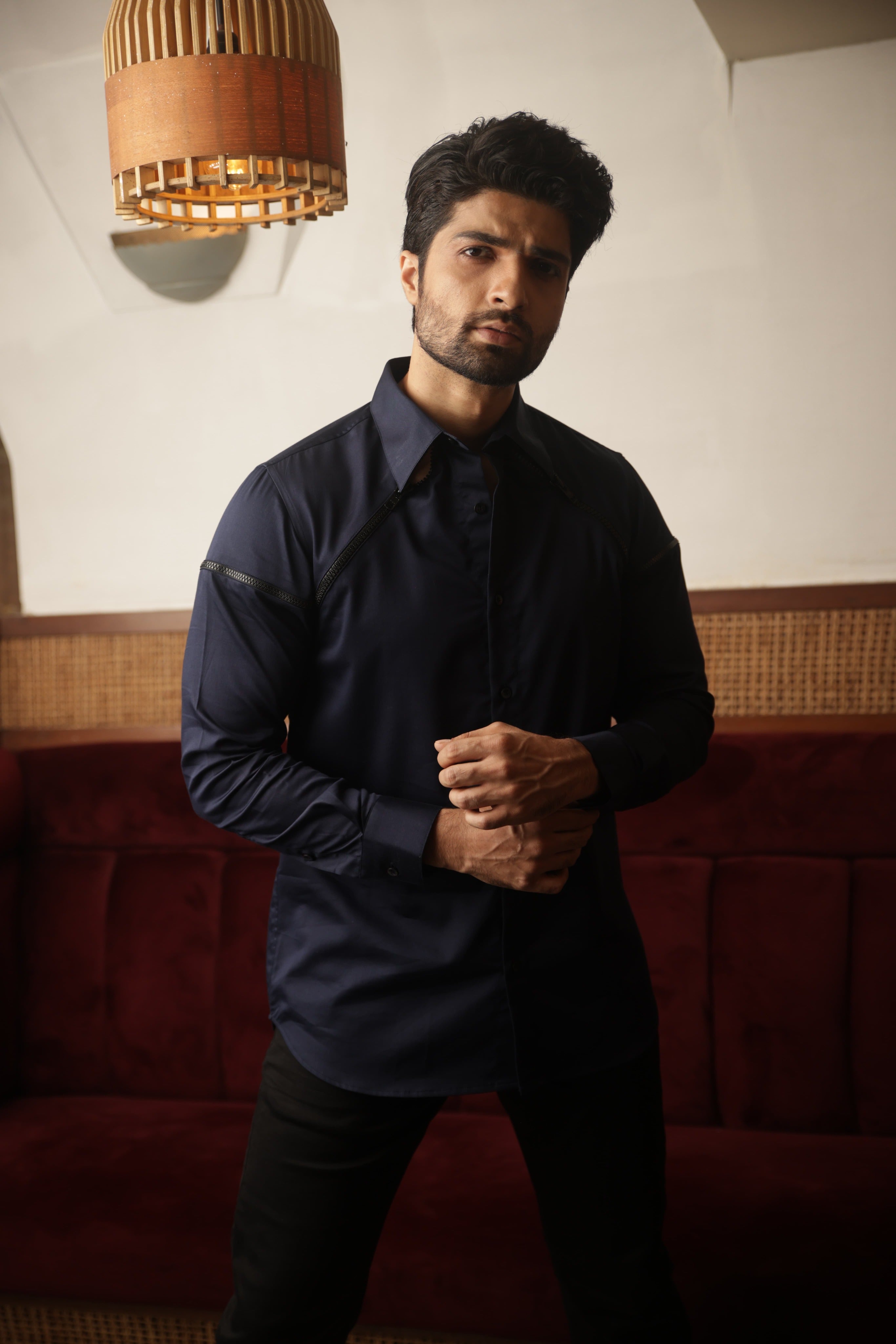 Blue shirt with black zipper feature