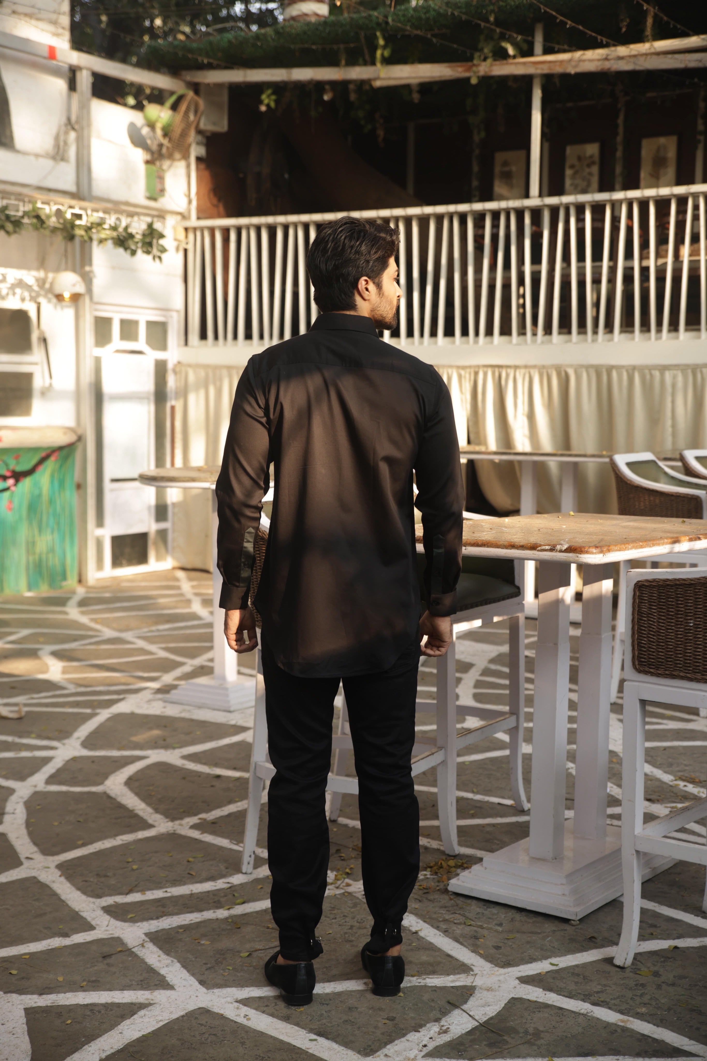 Black shirt with green pleates