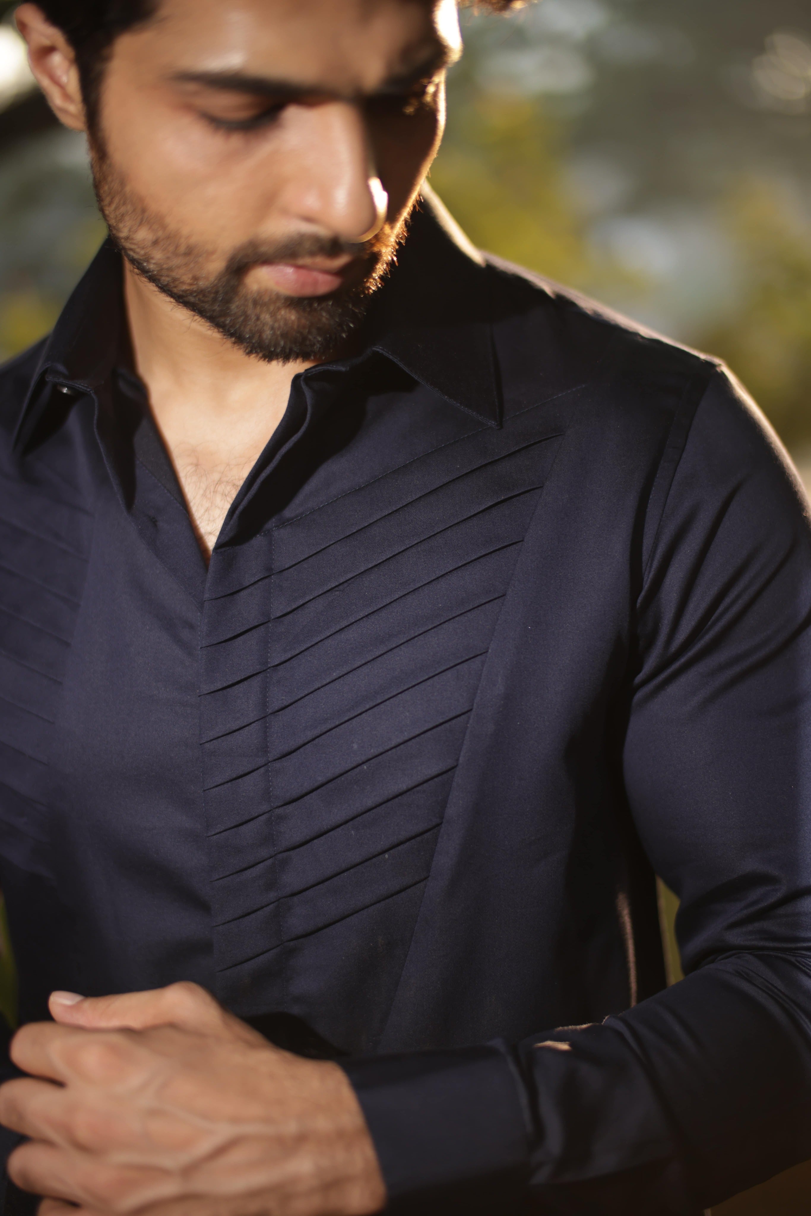 Blue shirt with geometric pattern