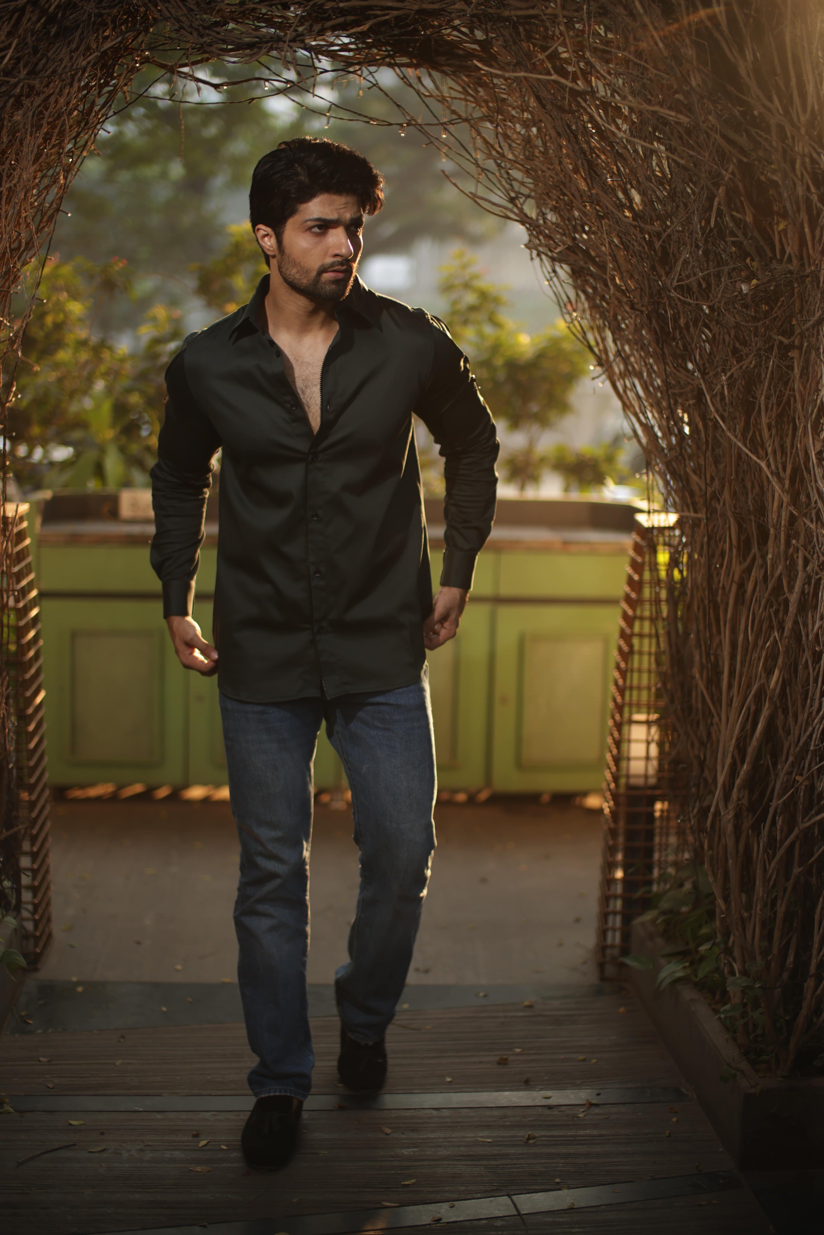 Green shirt with black zipper feature