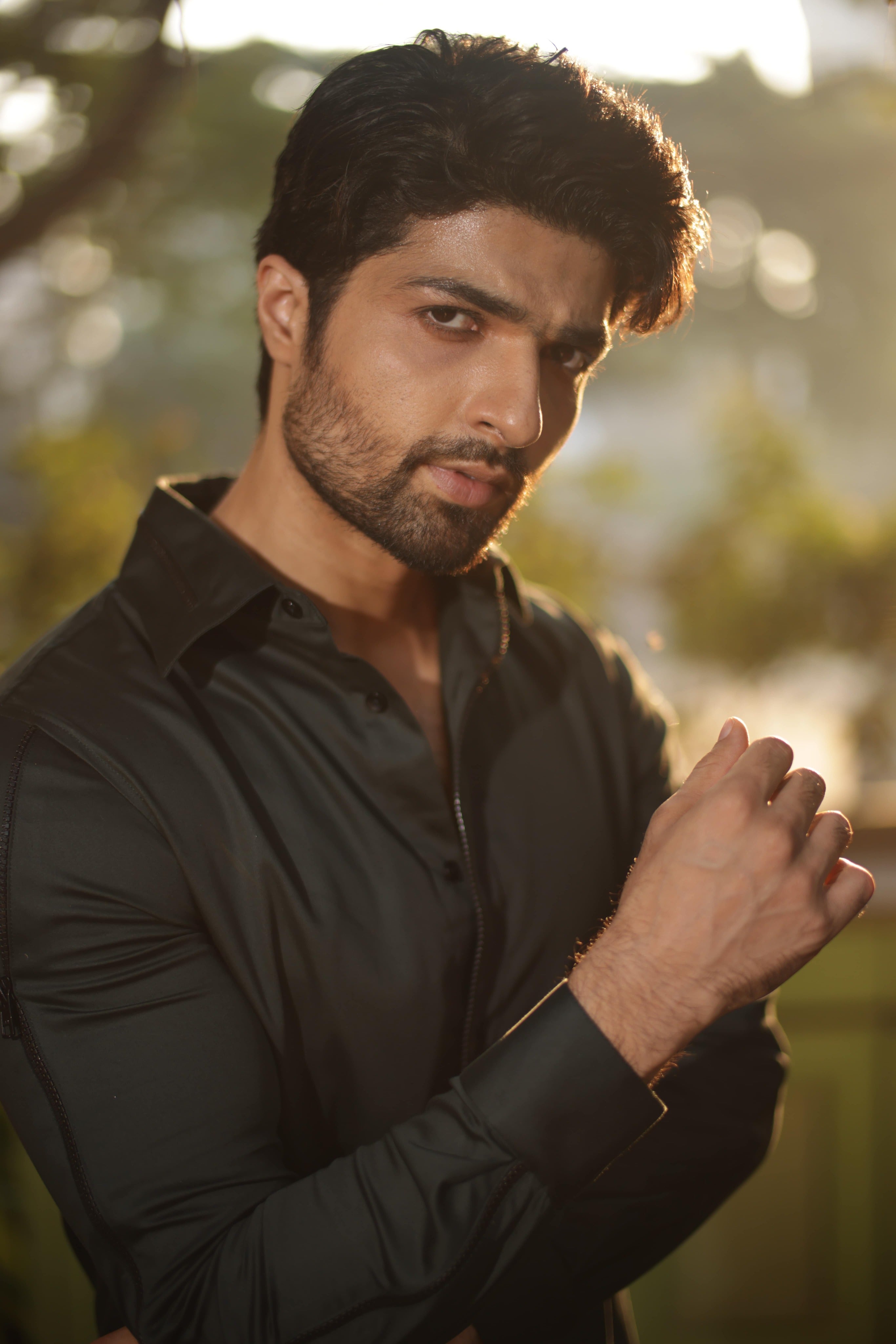 Green shirt with black zipper feature