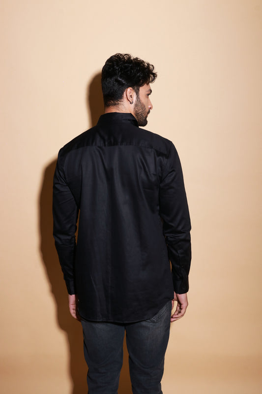 Black full sleeve shirt with tone on tone flap feature.