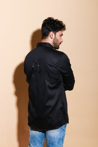 Black shirt with ring feature and back harness detailing.