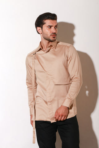 Beige classic shirt with diagonal flap with buckle.