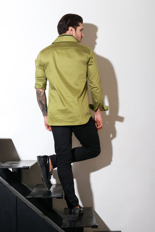 Moss green full sleeves shirt with self quilting, eyelets feature with black zipper accent.