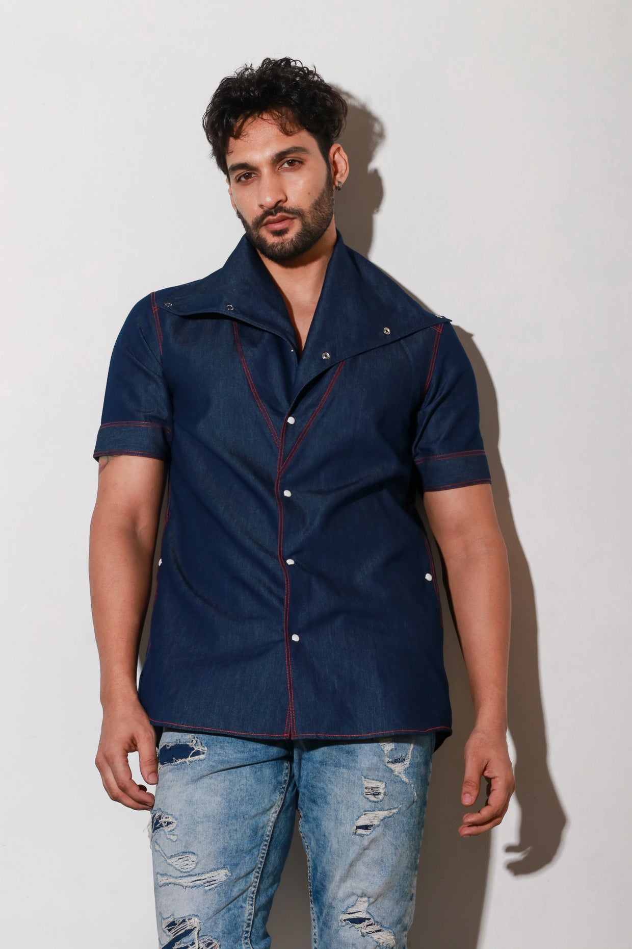 Denim short sleeves cowl neck feature with contrast red stitch detailing.