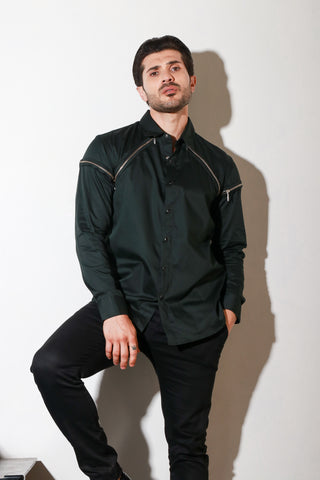 Green button down shirt with diagonal zipper feature .