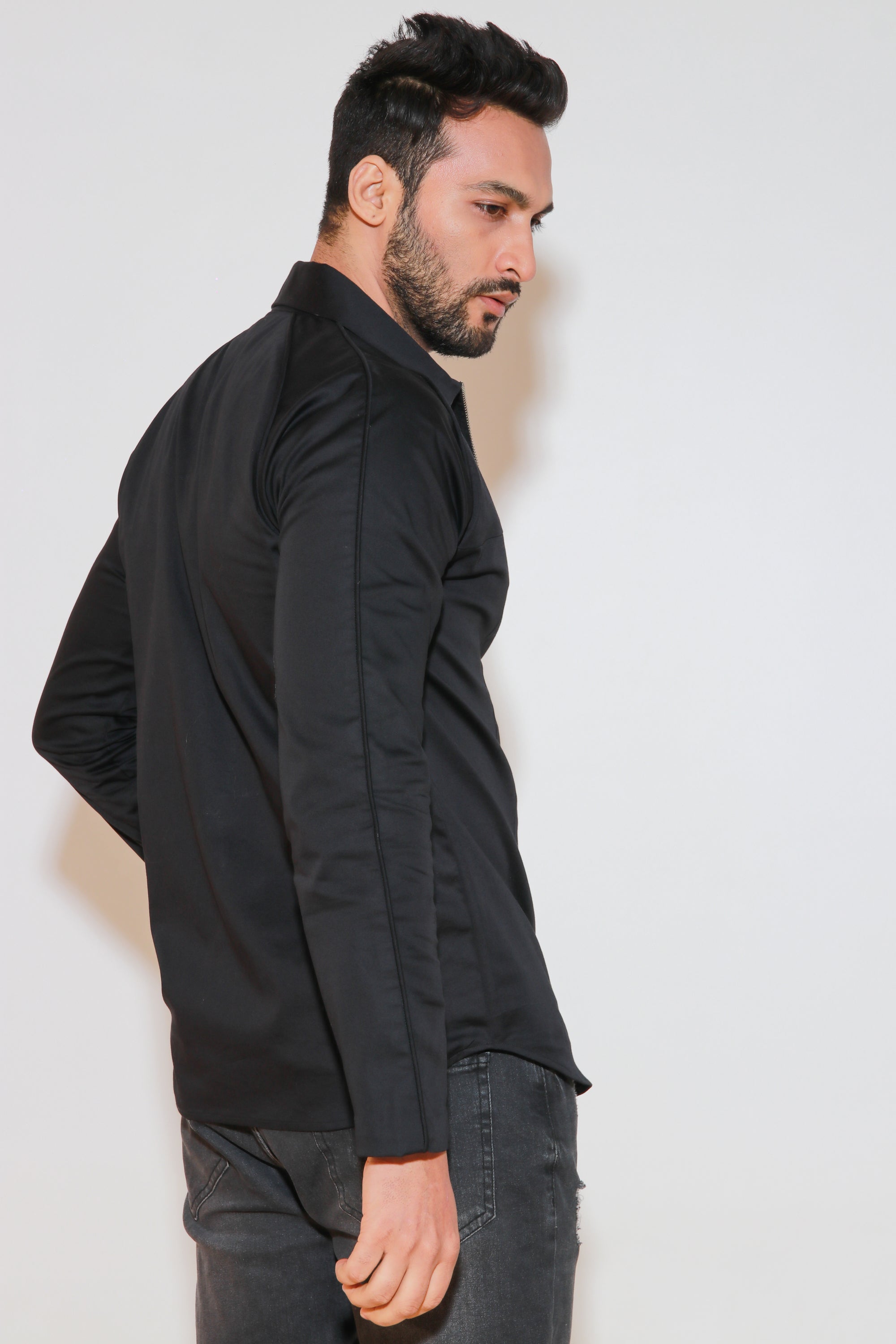 Black shirt with self cording and zippered placket.