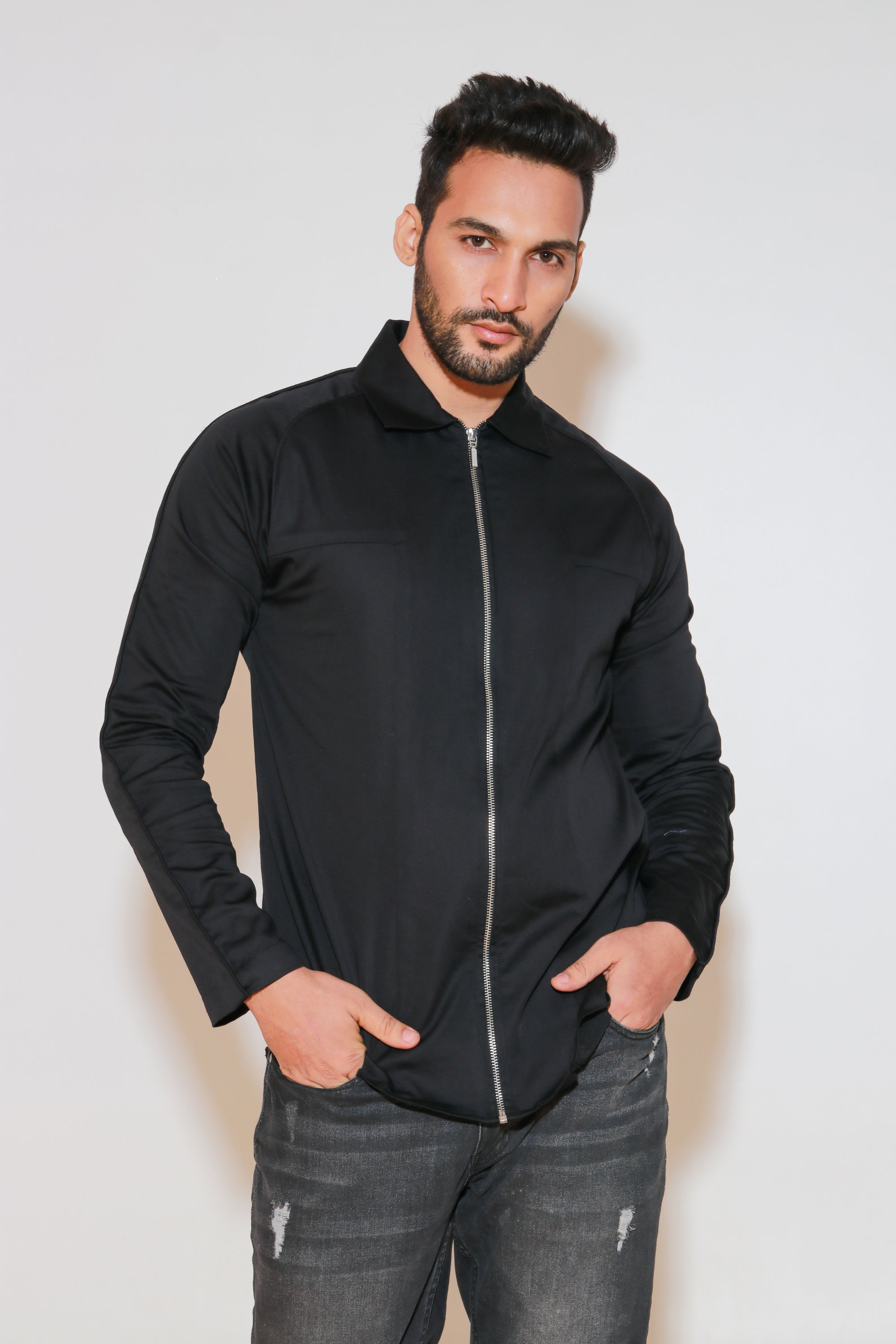 Black shirt with self cording and zippered placket.