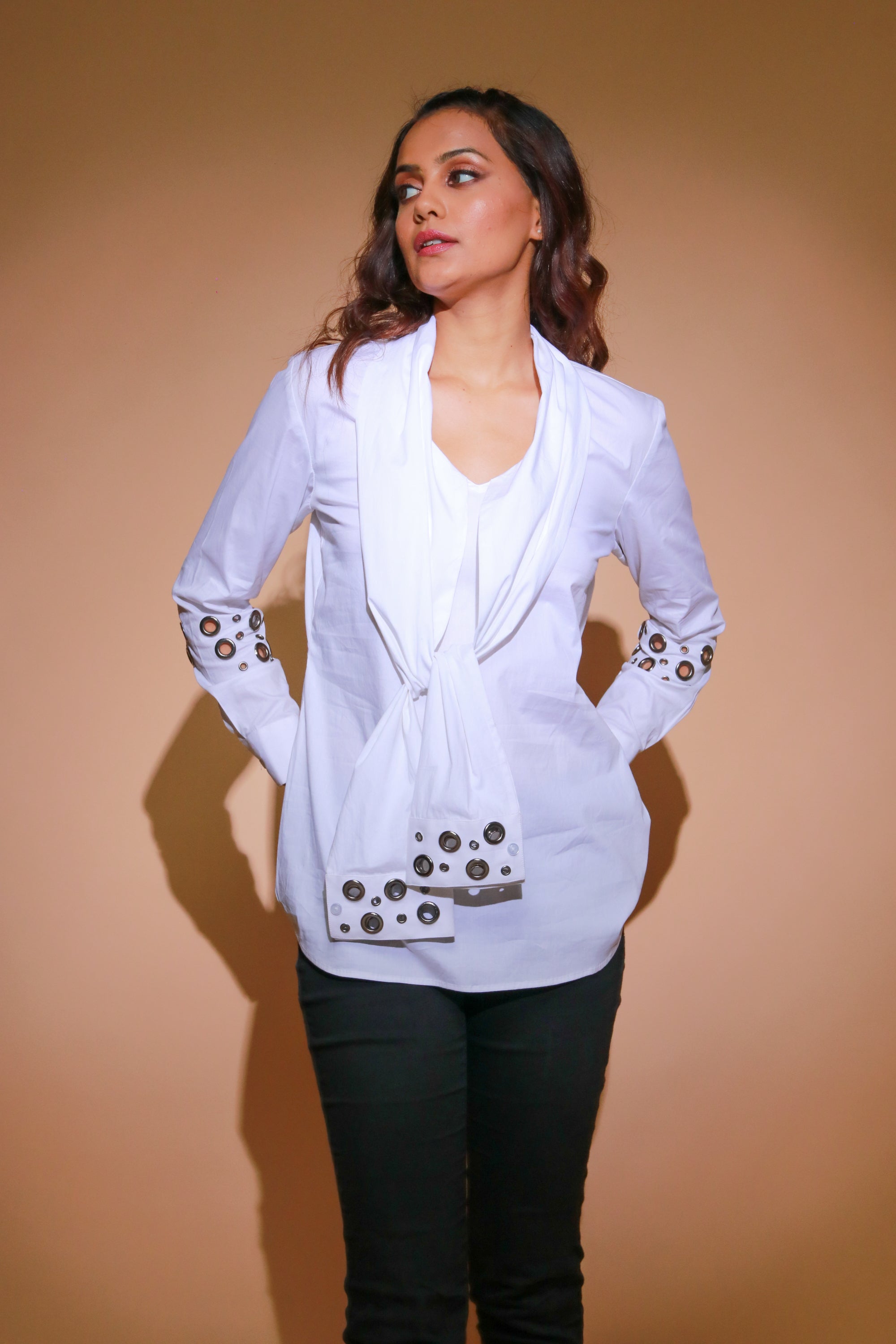 White four sleeves shirt with eyelet detailing.