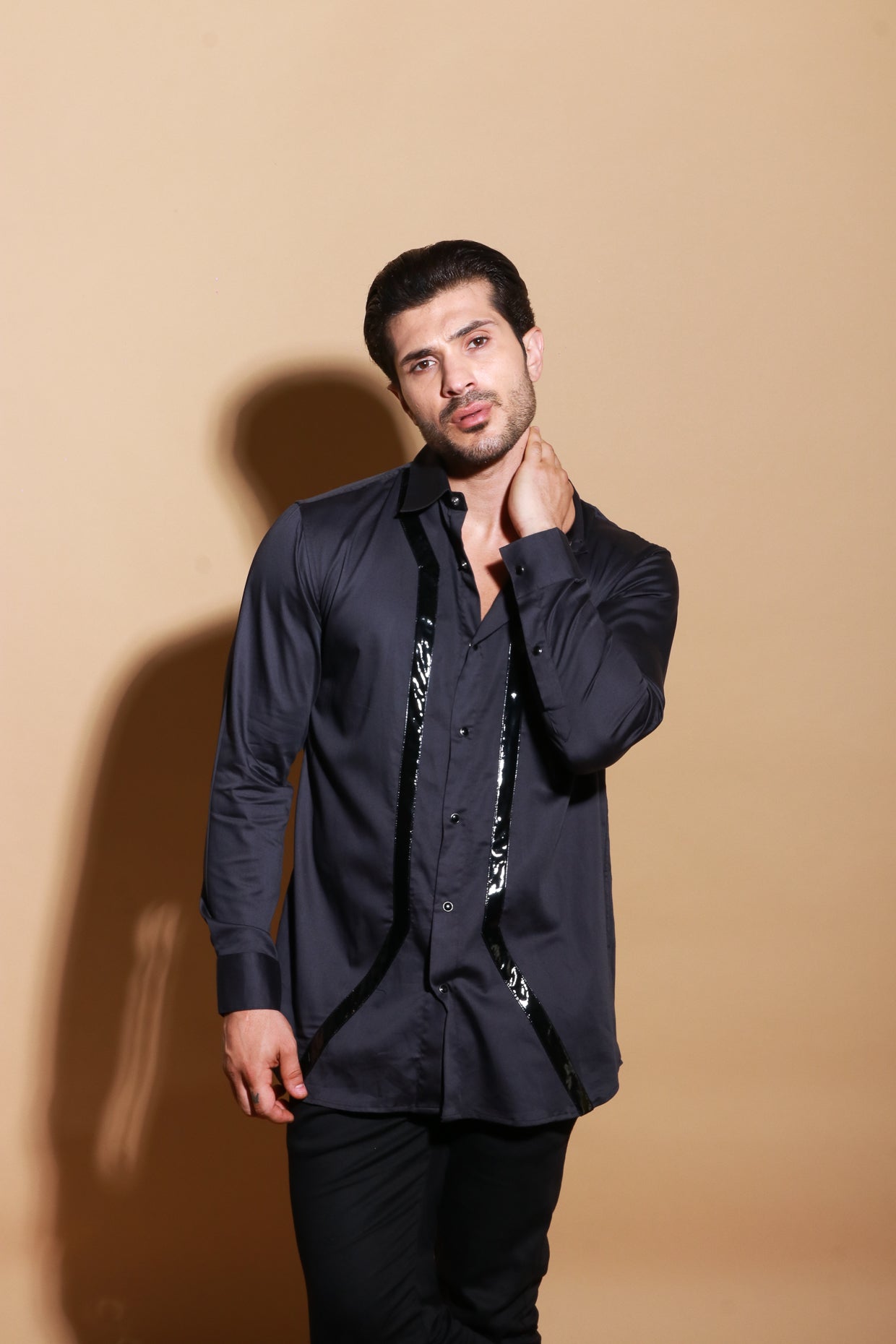 Black button down full sleeve shirt with patent stripes detailing.