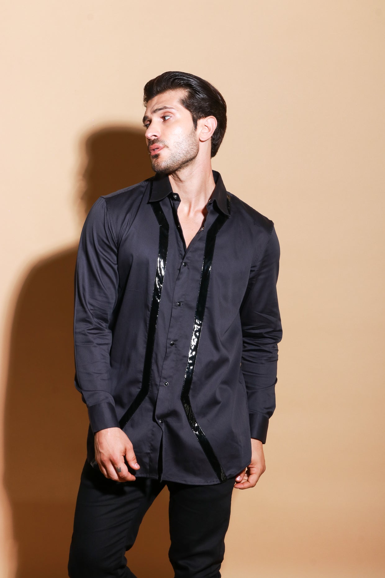 Black button down full sleeve shirt with patent stripes detailing.