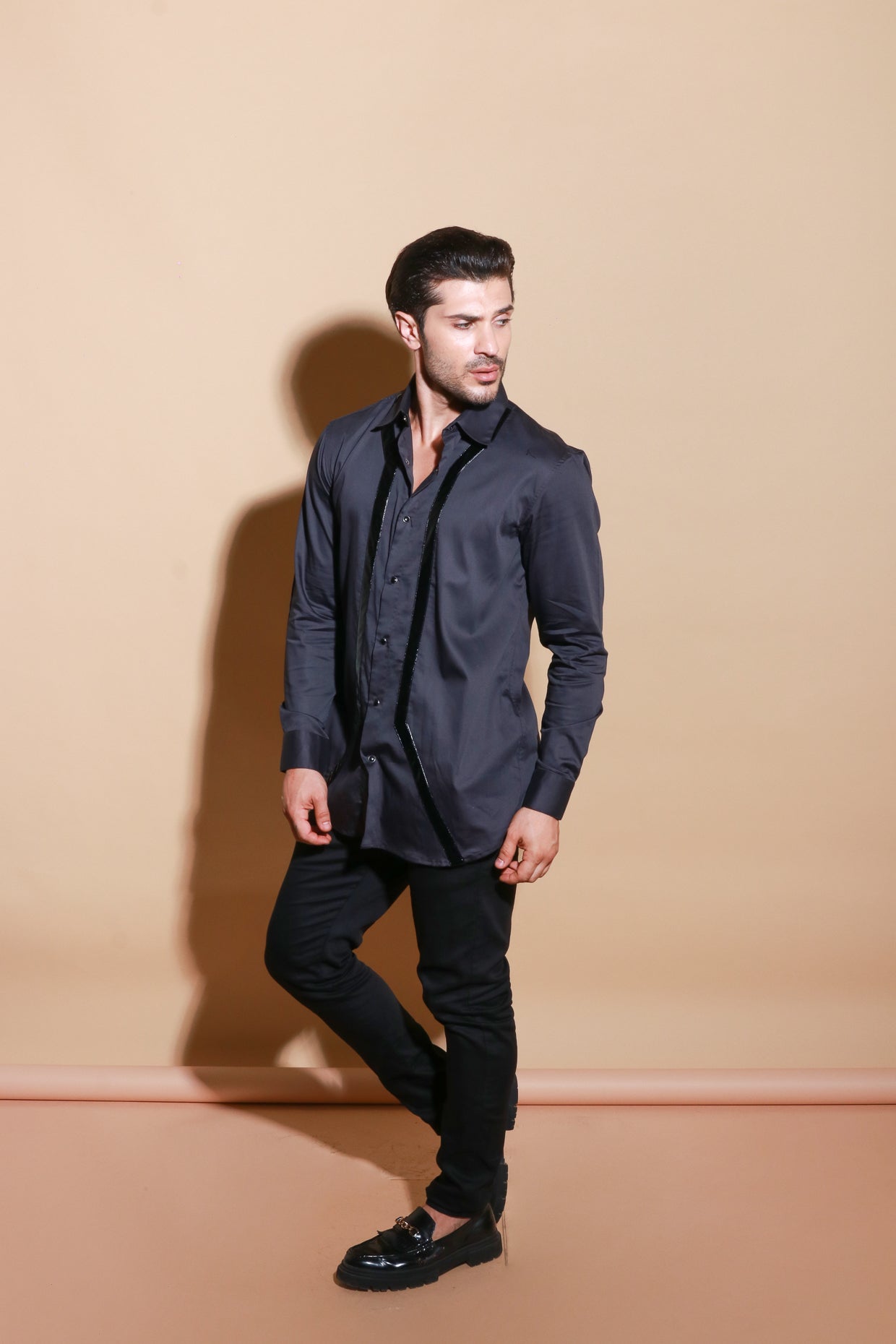 Black button down full sleeve shirt with patent stripes detailing.
