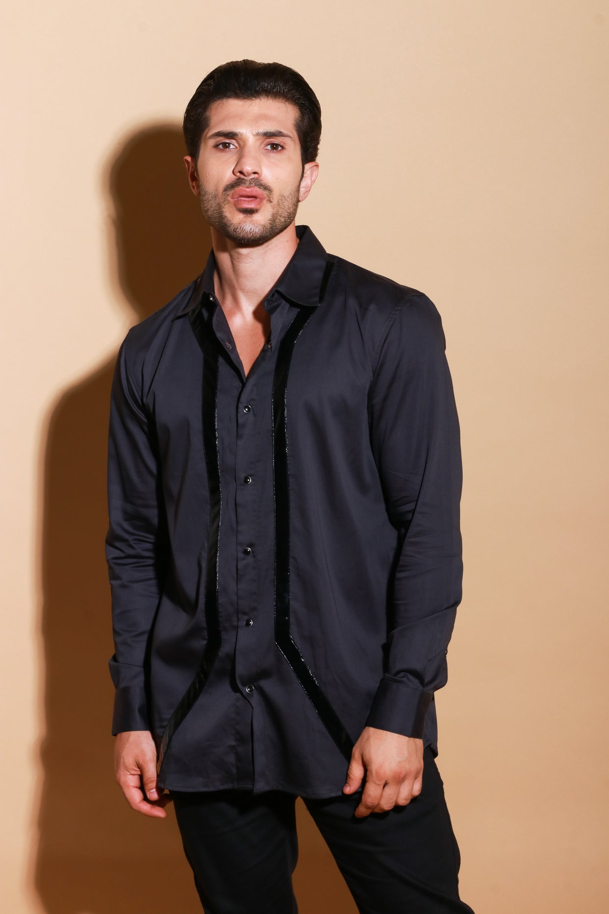 Black button down full sleeve shirt with patent stripes detailing.