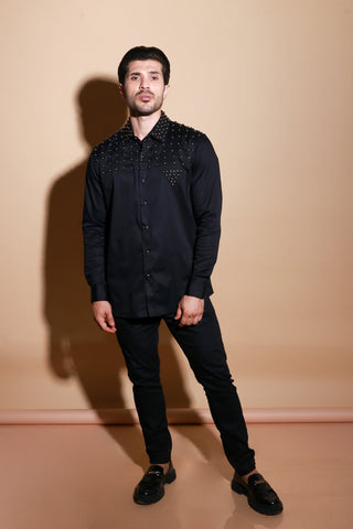 Black full sleeve shirt with muted stud detailing .