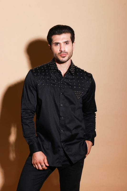 Black full sleeve shirt with muted stud detailing .