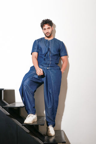 Denim co-ord set features a short sleeved top with double flap pants.