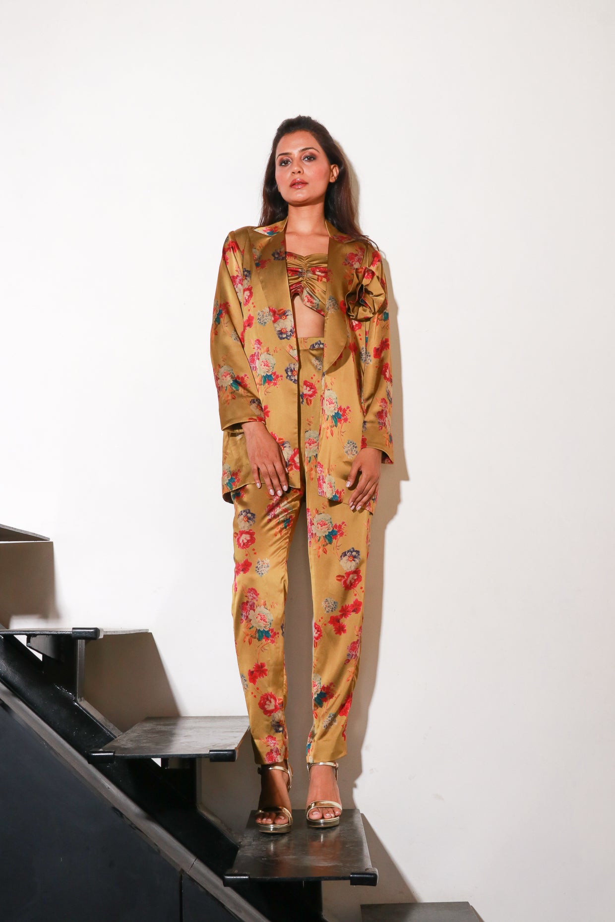 Floral diva pant suit with bustier inside.
