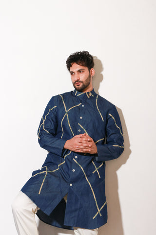 Denim knee length kurta with abstract crepe print detailing and off white narrow pants.