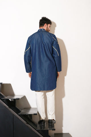 Denim knee length kurta with abstract crepe print detailing and off white narrow pants.