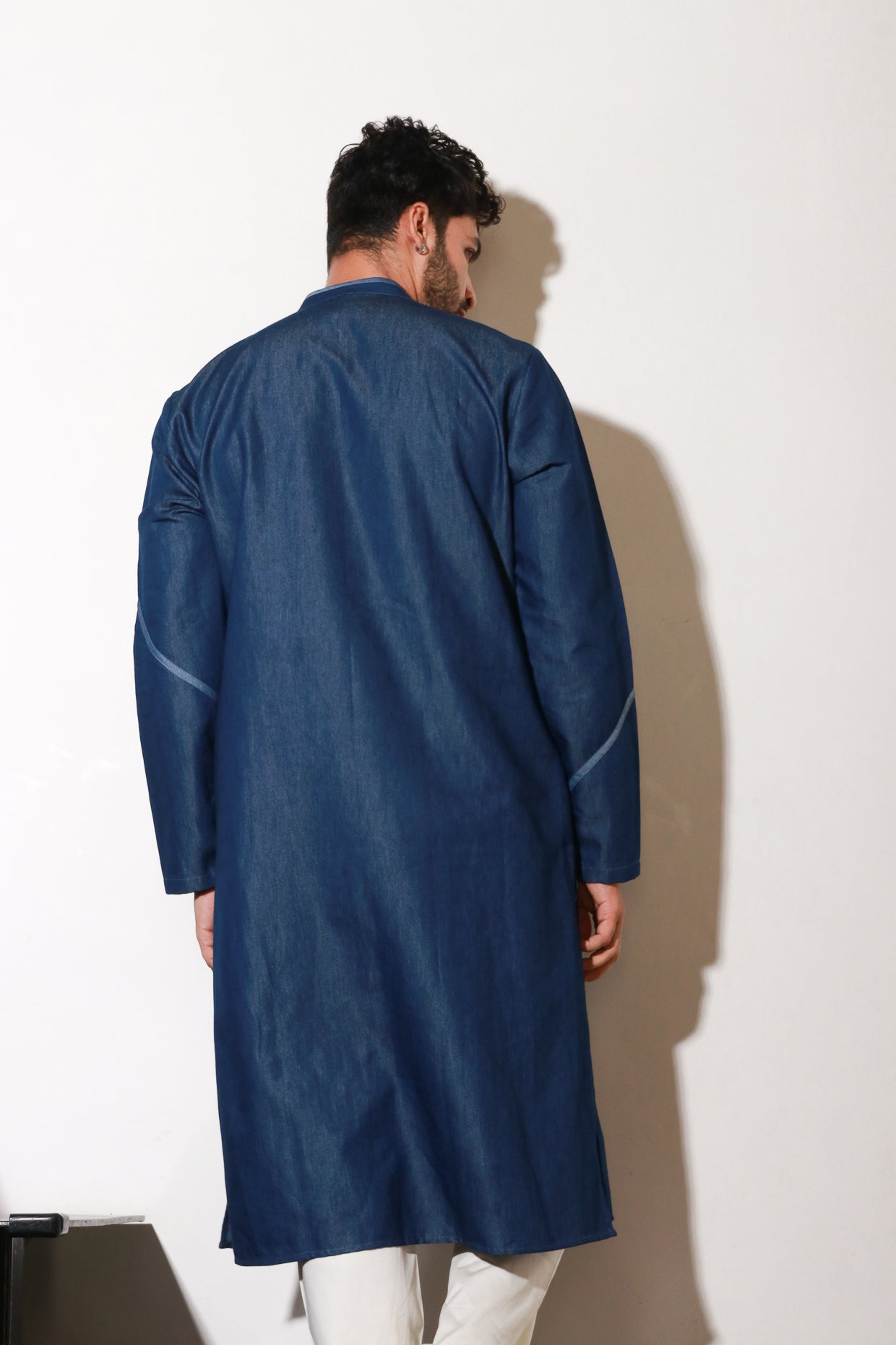 Denim long kurta with crepe printed wave detailing with off white narrow pants.