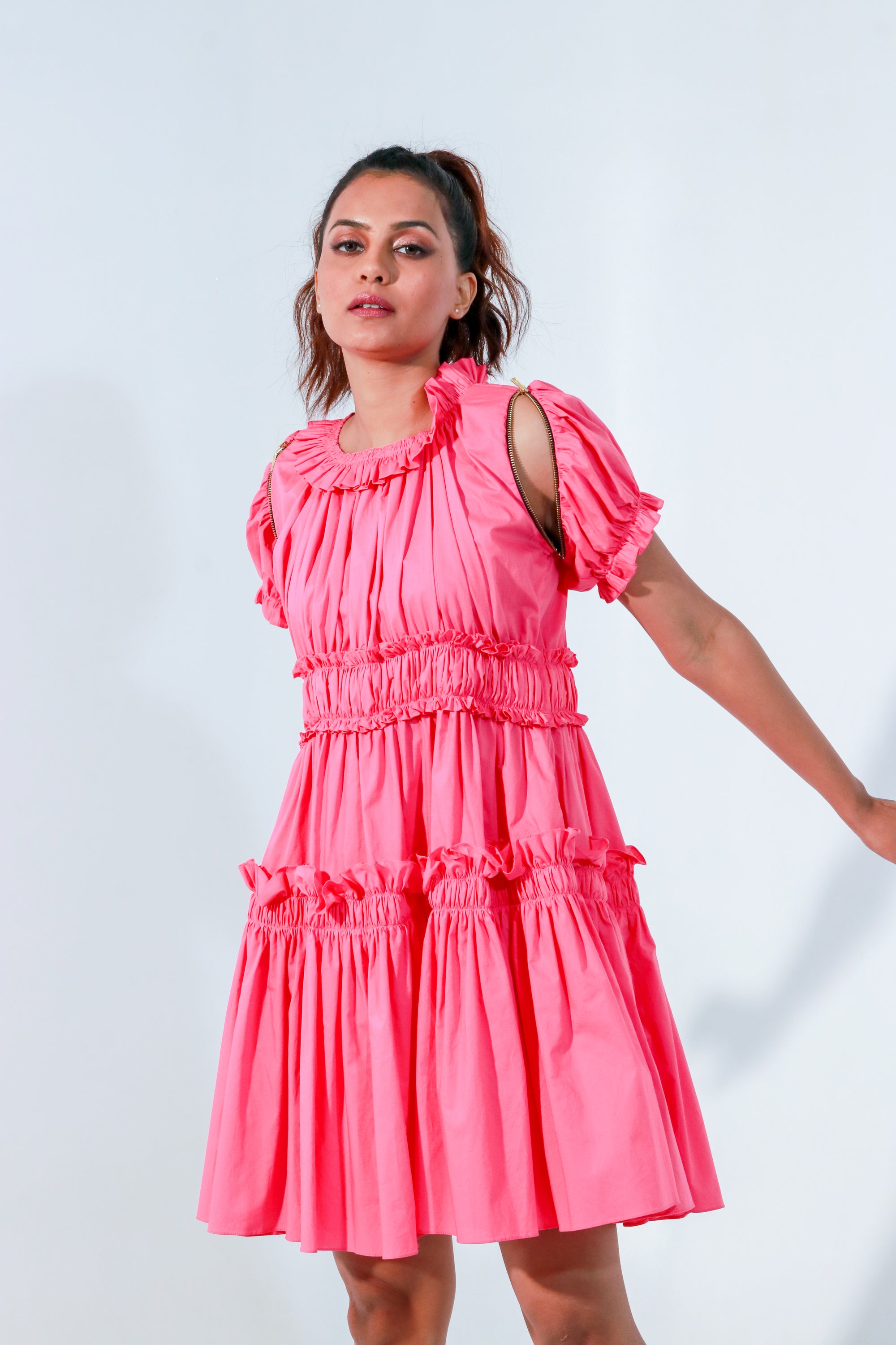 Pink dress with ruffles and detachable zippered sleeves