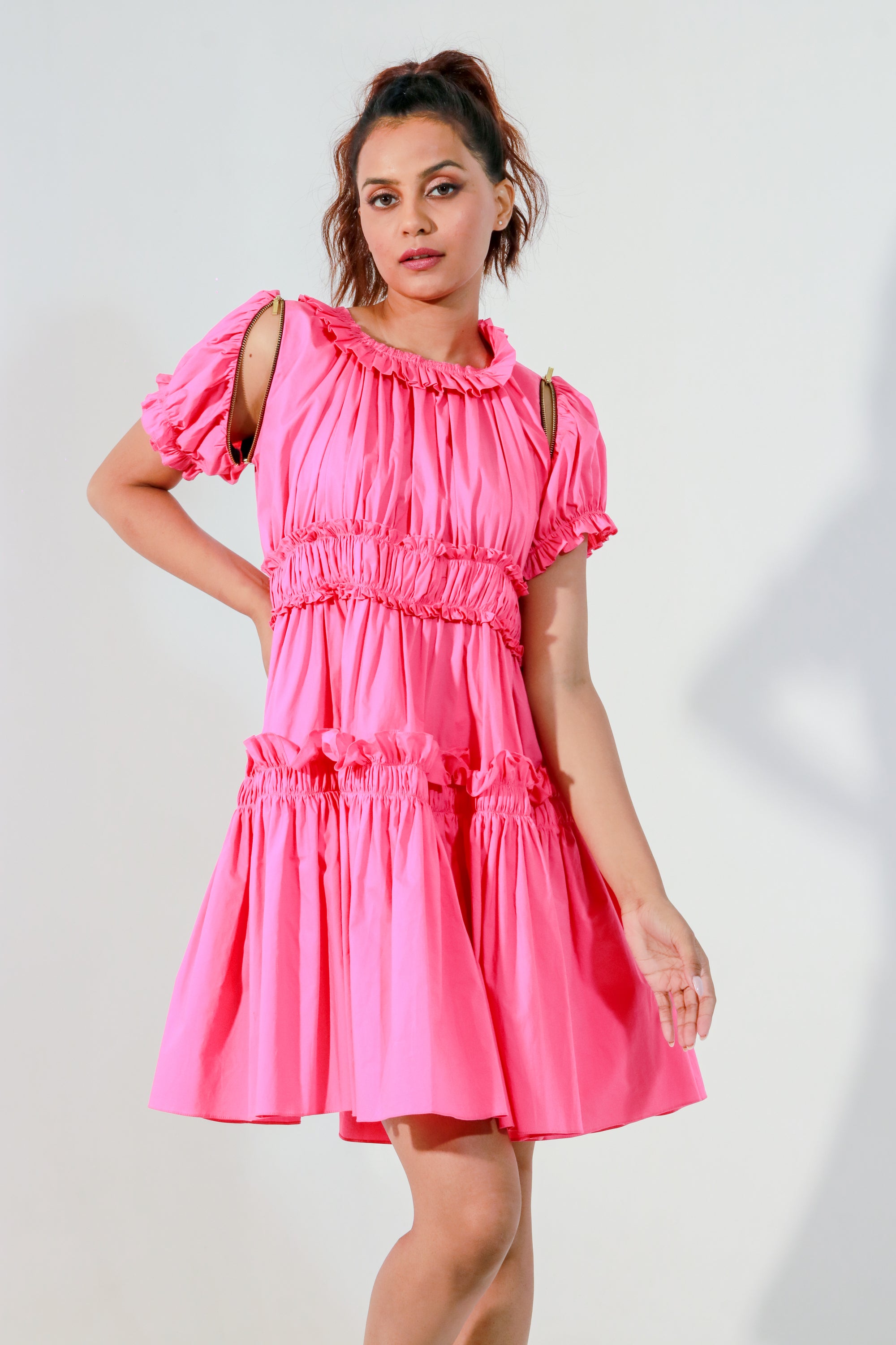 Pink dress with ruffles and detachable zippered sleeves