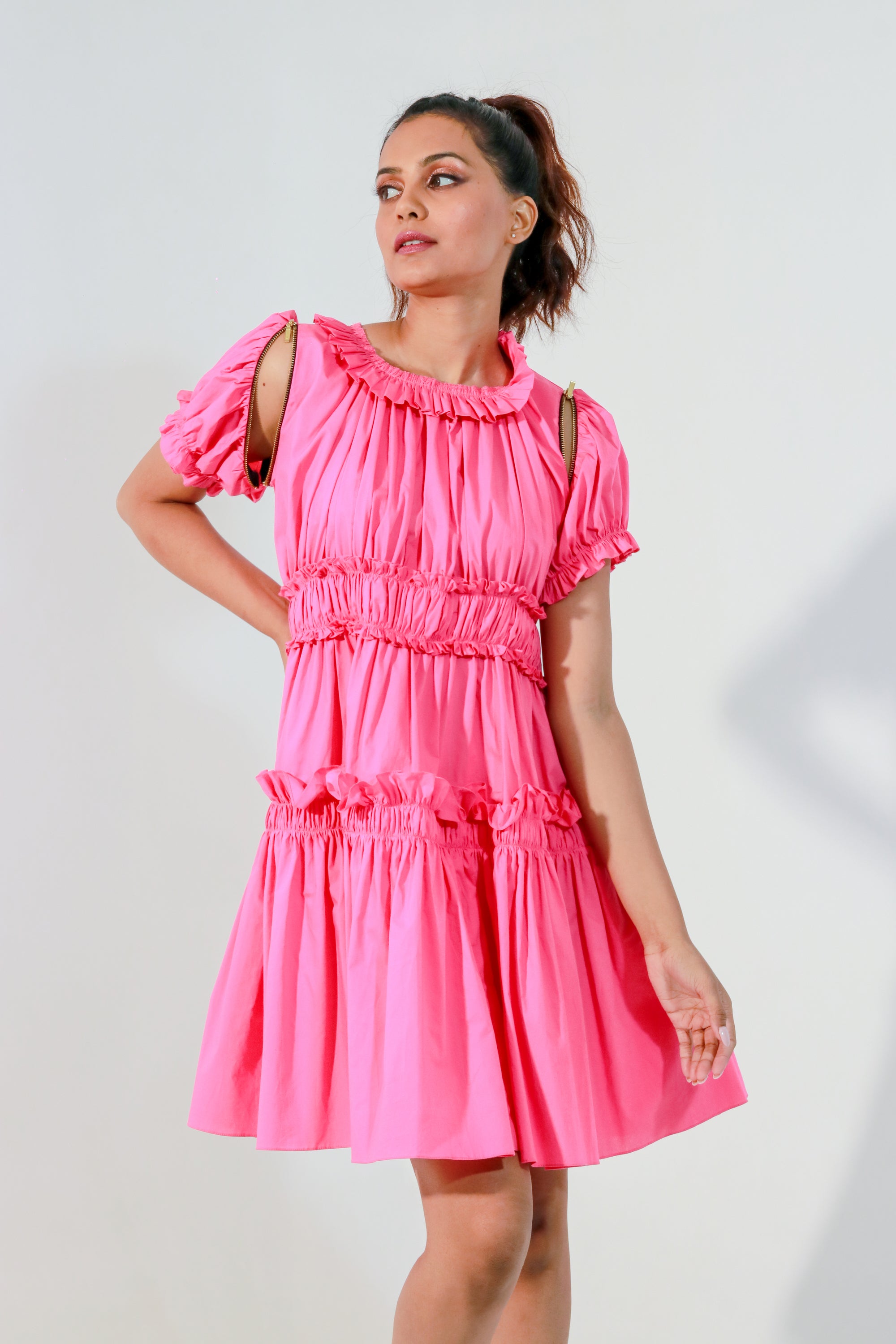 Pink dress with ruffles and detachable zippered sleeves