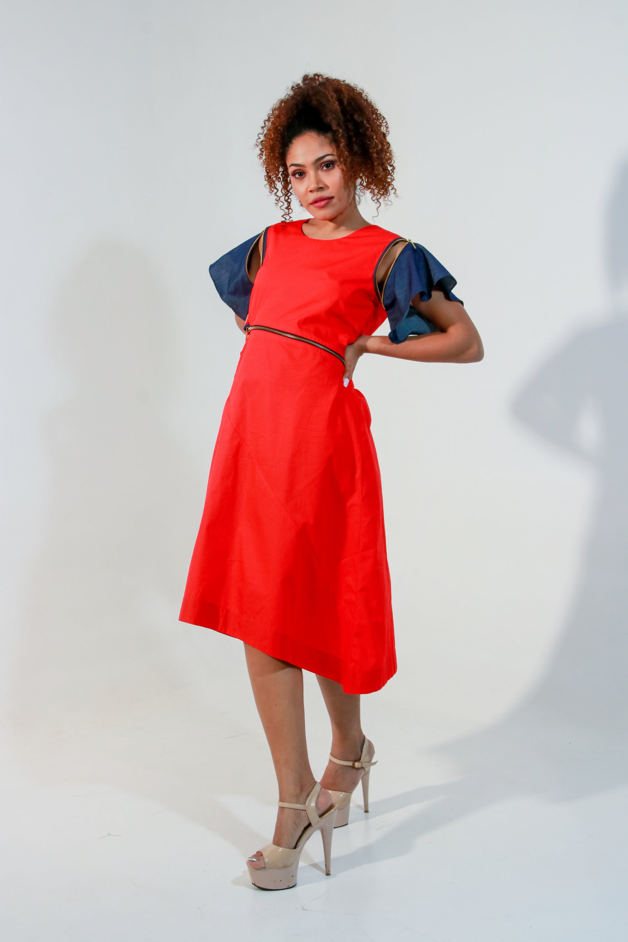 Coral dress with waist zipper and cut out feature