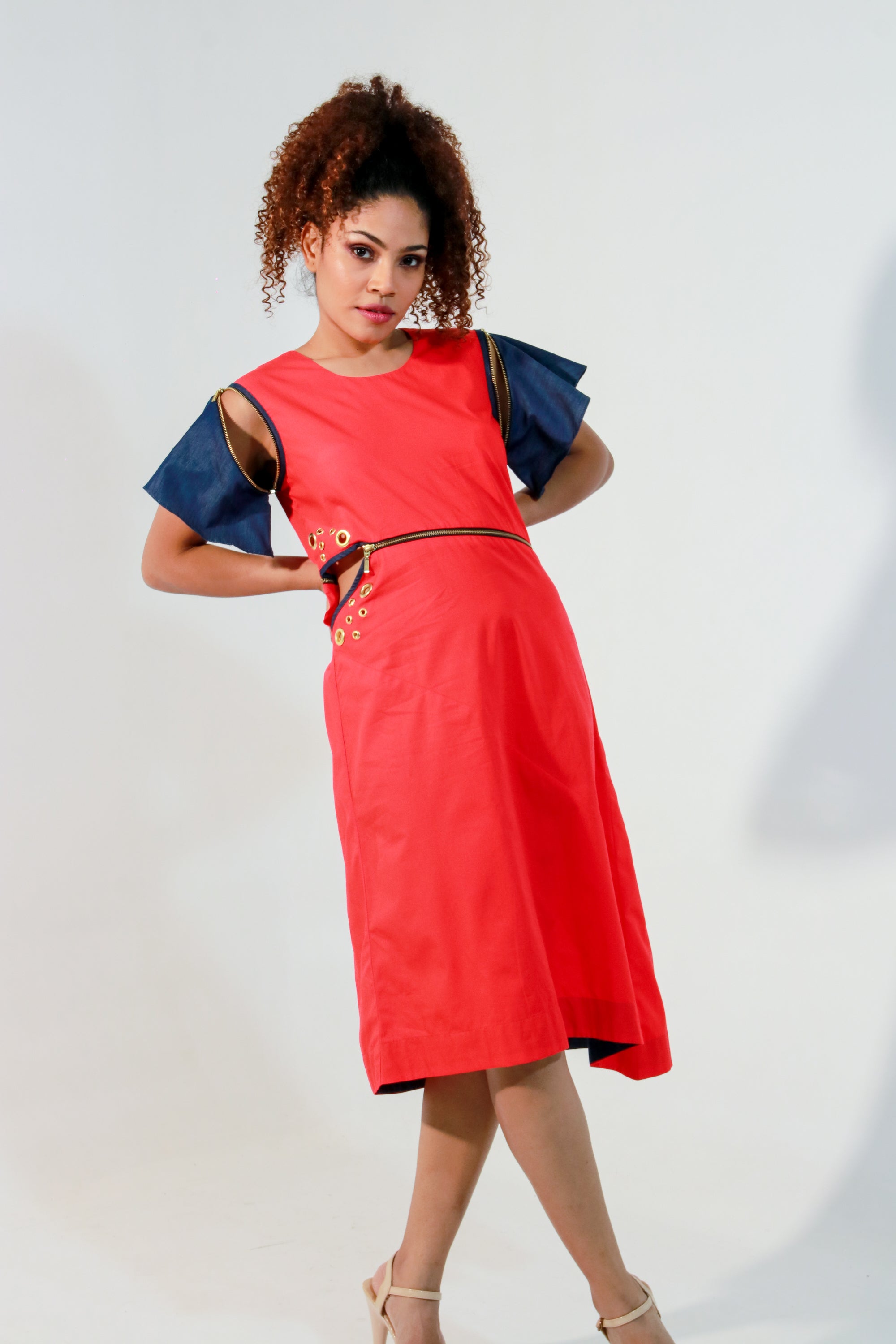 Coral dress with waist zipper and cut out feature