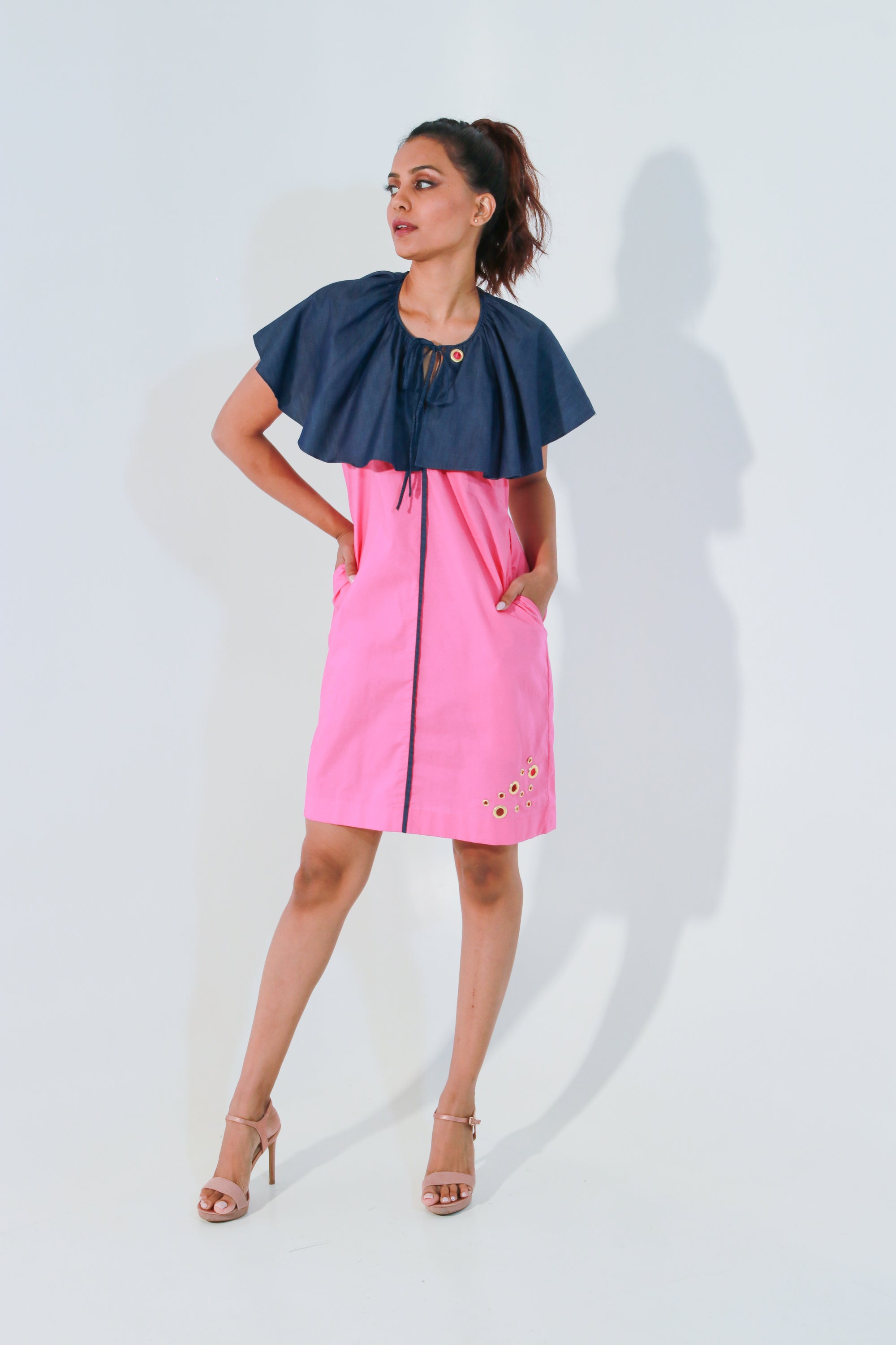 Pink and denim dress with cape feature