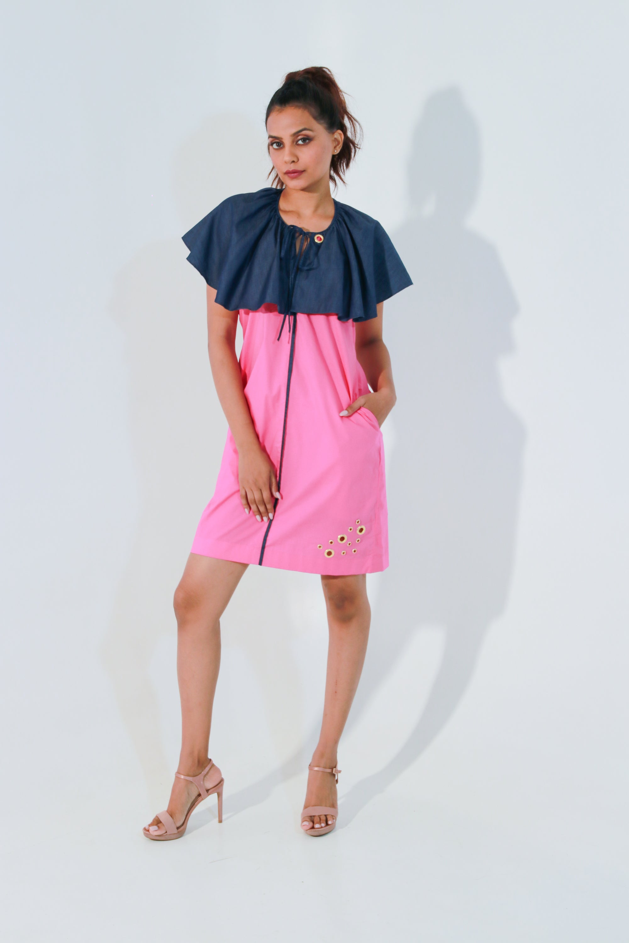 Pink and denim dress with cape feature