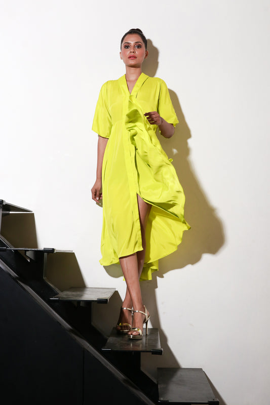 Yellow French crepe dress with flared center and back feature.