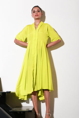 Yellow French crepe dress with flared center and back feature.