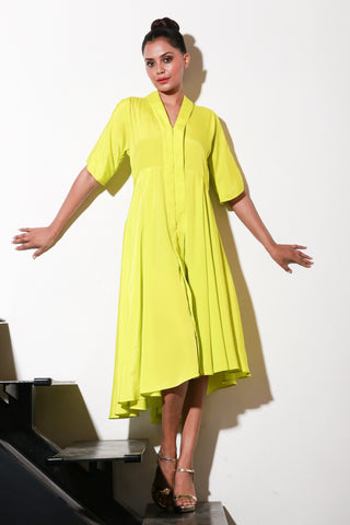 Yellow French crepe dress with flared center and back feature.