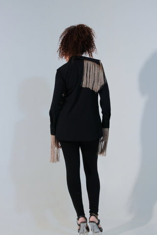 Black shirt is crafted in rayon with full sleeves with extended collar and tassels detailing.