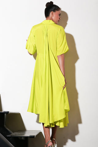 Yellow French crepe dress with flared center and back feature.