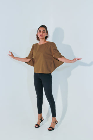 Brown top features angular slit sleeves and round neck.