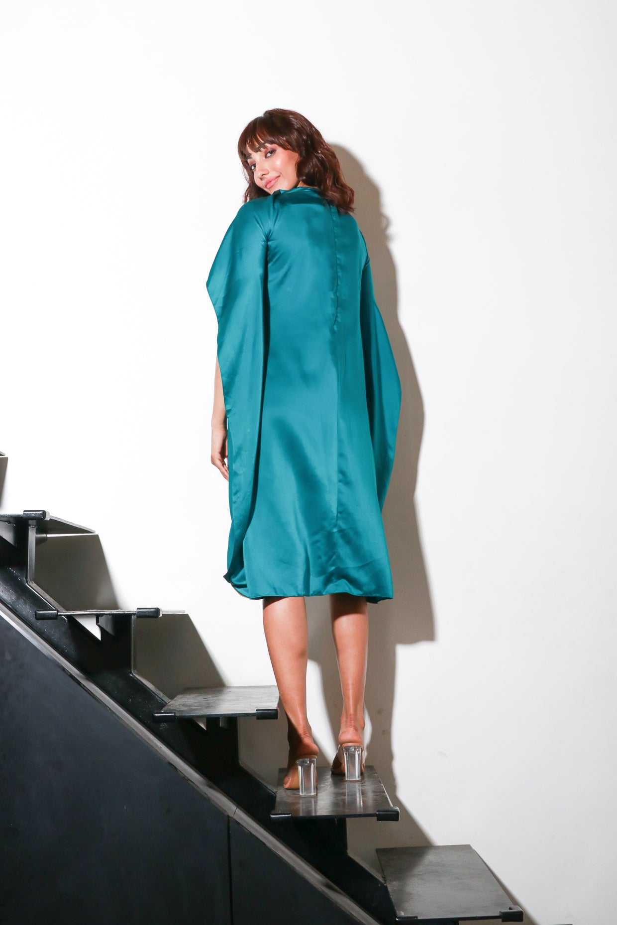 Teal milano dress with cape feature with front wide slit feature and zip
