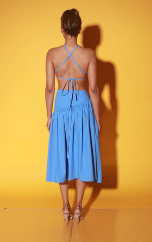 Slate blue midi dress with spaghetti straps and ruching detailing on the waist.