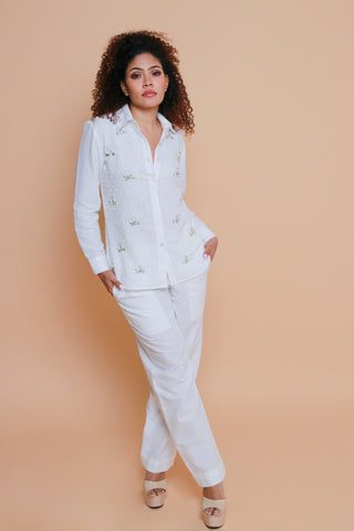 White co-ord set in pure linen with stone embellishment on shirt.