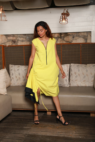 Asymmetric yellow sleeveless dress with one side ruching feature.