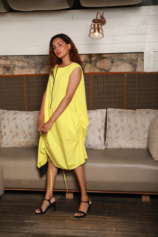 Asymmetric yellow sleeveless dress with one side ruching feature.