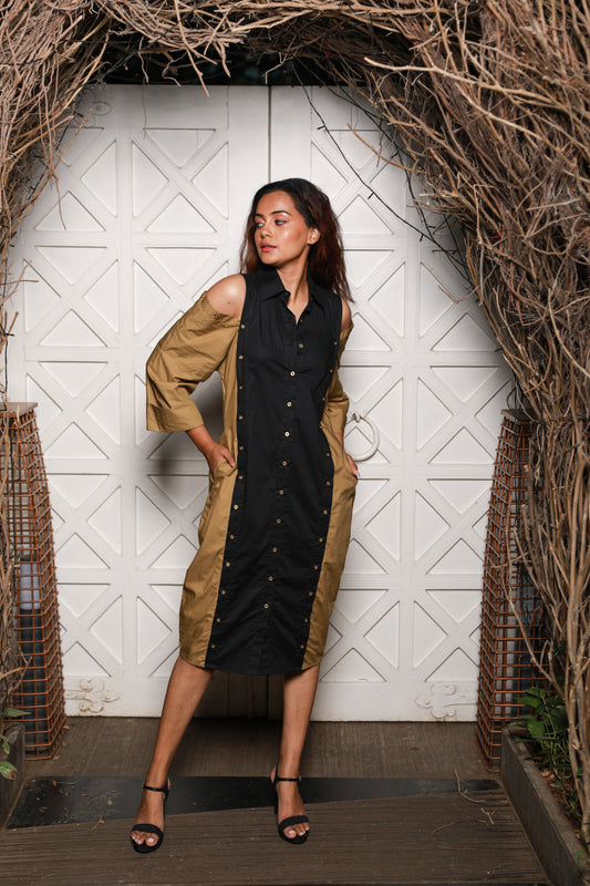 Two-toned  shirt dress features khaki and black vertical panels with cold shoulders.