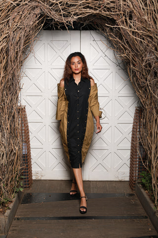 Two-toned  shirt dress features khaki and black vertical panels with cold shoulders.